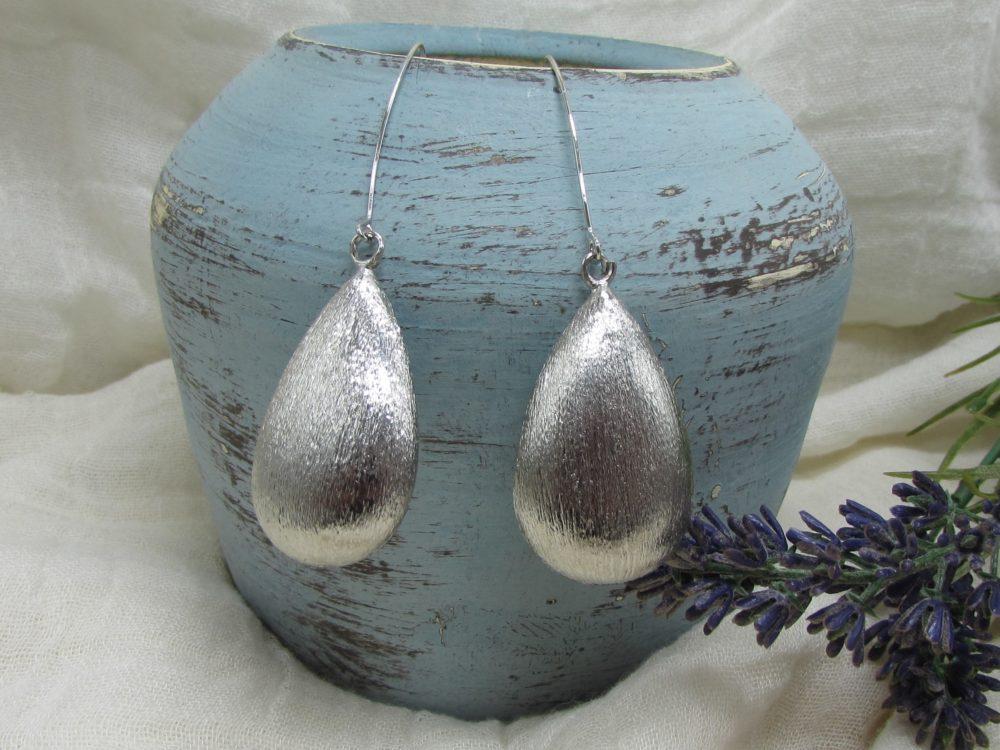 pendientes de zamak
