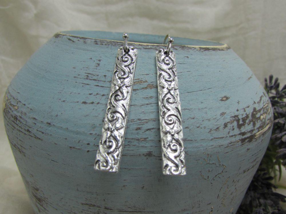 pendientes de zamak